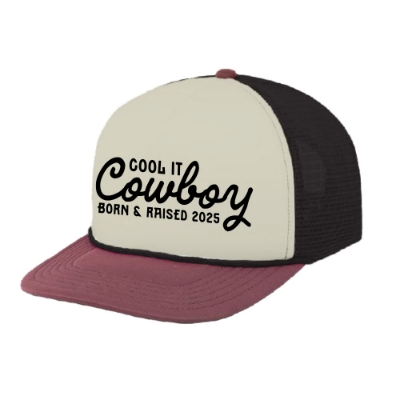 Front view of Born & Raised Cowboy Hat with “Cool It Cowboy” text on cream panel, burgundy brim, and black mesh back