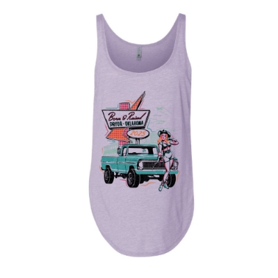 Lavender tank top with retro pin-up girl and truck graphic reading "Born & Raised Pryor Oklahoma 2025"